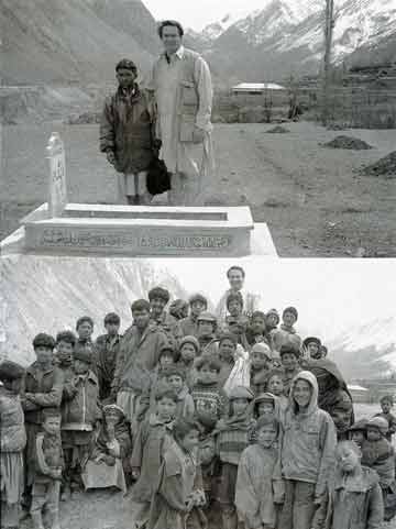 
Top: Greg Mortenson and Twaha in Korphe, at the grave of Twaha's father, Haji Ali.Bottom: Greg Mortenson with Korphe's children - Three Cups Of Tea book
